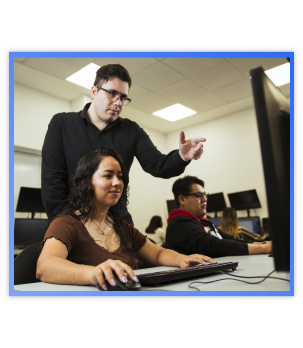 Channel Demand Mapping_Collapsible list Man pointing at projector screen talking to a woman
